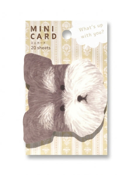Mini cards featuring cute Inu and Isu dog illustrations from JapanoMono's Hokkori Dog stationery collection, displayed on a flat surface.