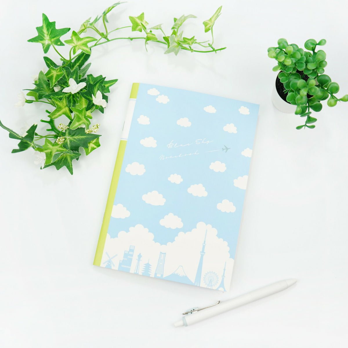 Frontia A5 notebook with pastel sky and Japan cityscape cover, featuring a soft, artistic design for note-taking and journaling.