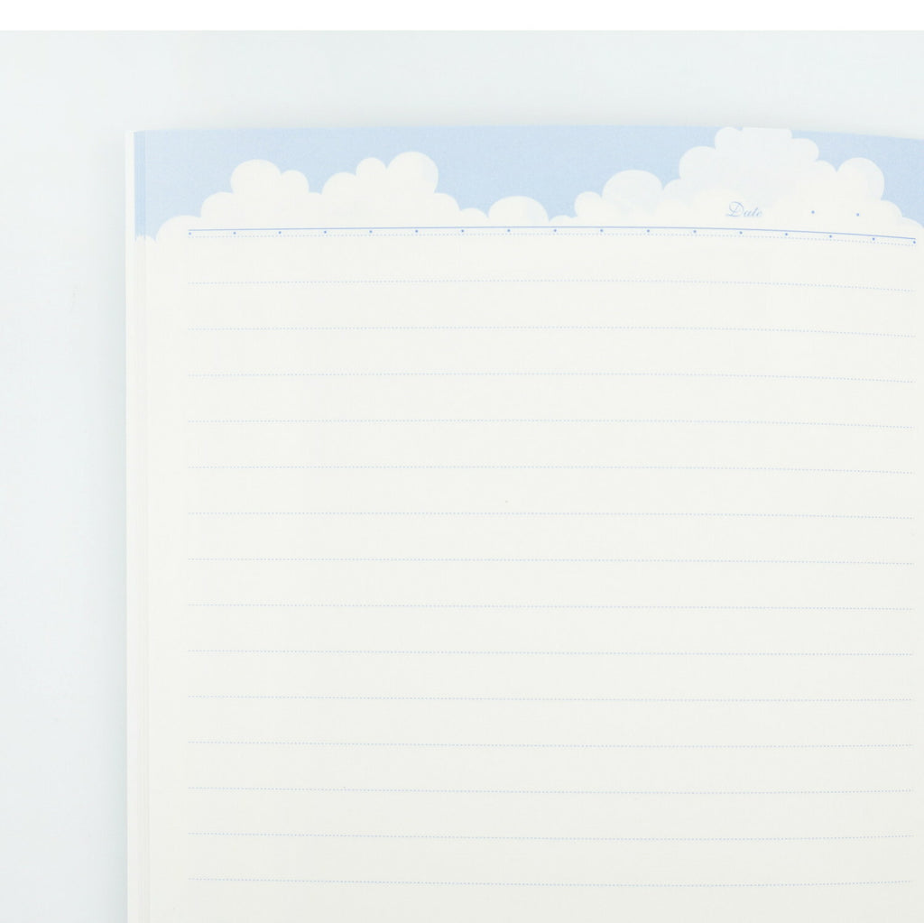 Frontia A5 notebook with pastel sky and Japan cityscape cover, featuring a spiral binding and lined pages.