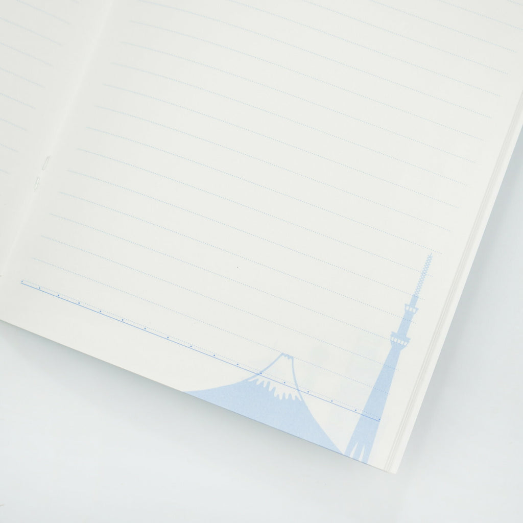 Frontia A5 notebook featuring pastel sky and Japan cityscape cover design, with lined pages for note-taking and journaling.