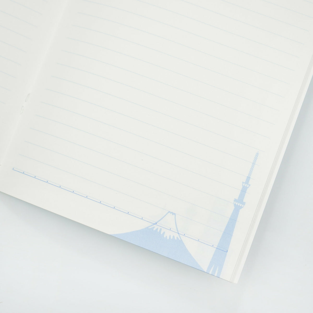 Frontia A5 notebook featuring pastel sky and Japan cityscape cover design, with lined pages for note-taking and journaling.