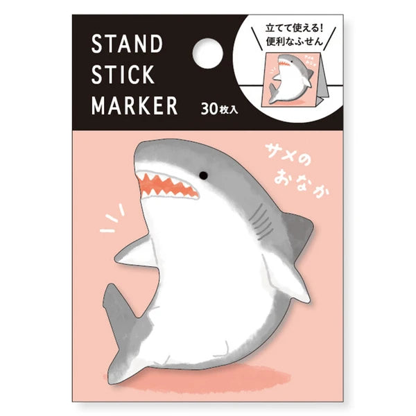 MIND WAVE Shark sticky notes stand with colorful sticky note markers for organization and note-taking on a desk.