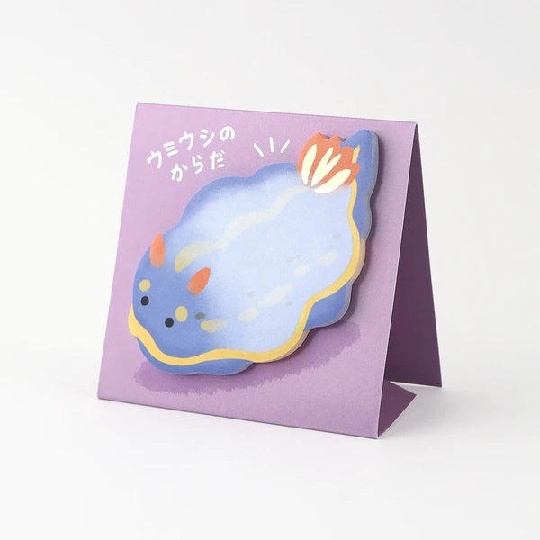 MIND WAVE sticky notes stand with colorful stick markers featuring nudibranch designs, ideal for organizing and note-taking.