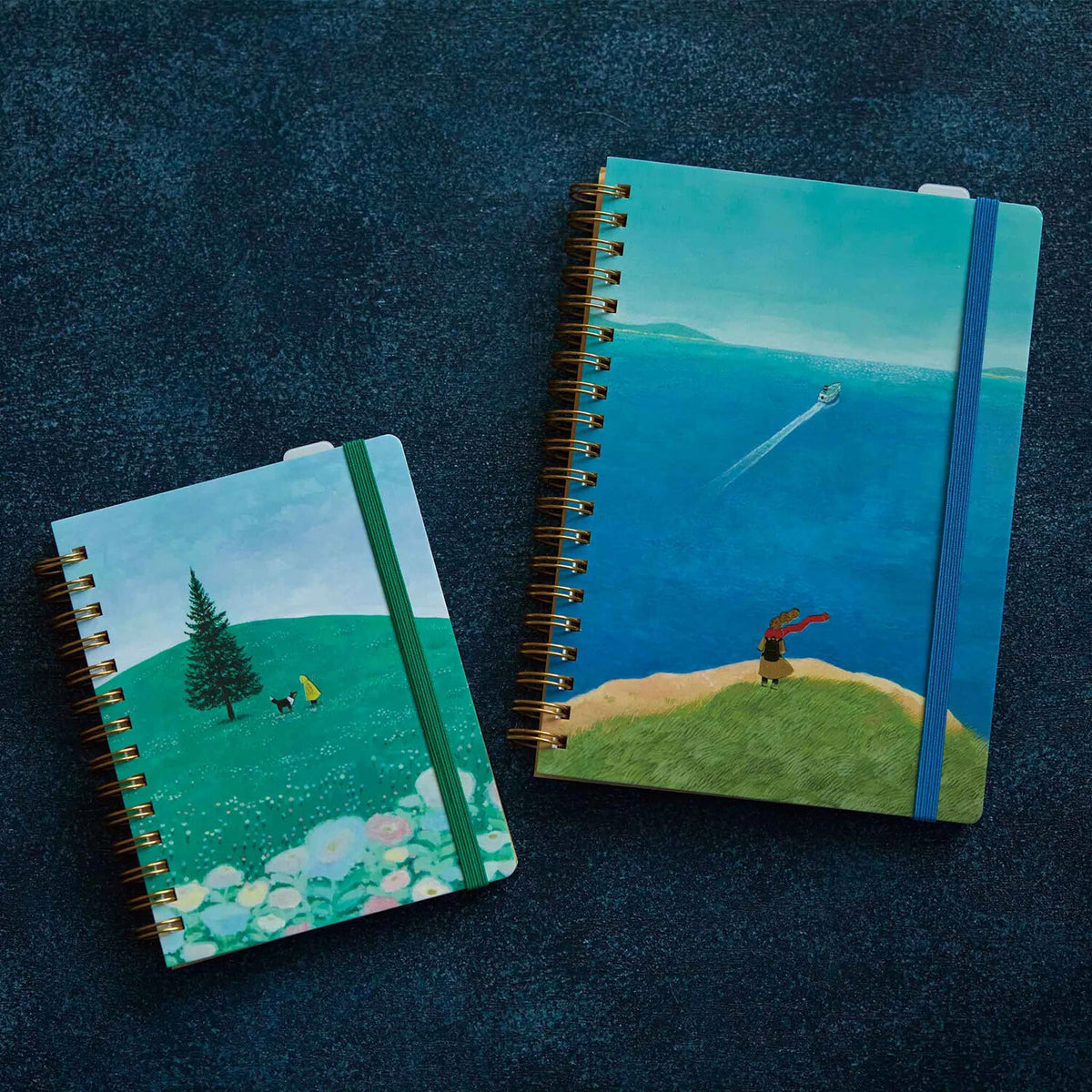 Zoomy BUNGU scenic ocean cliff and speedboat comic-size ring journal notebook with illustrated cover and spiral binding.