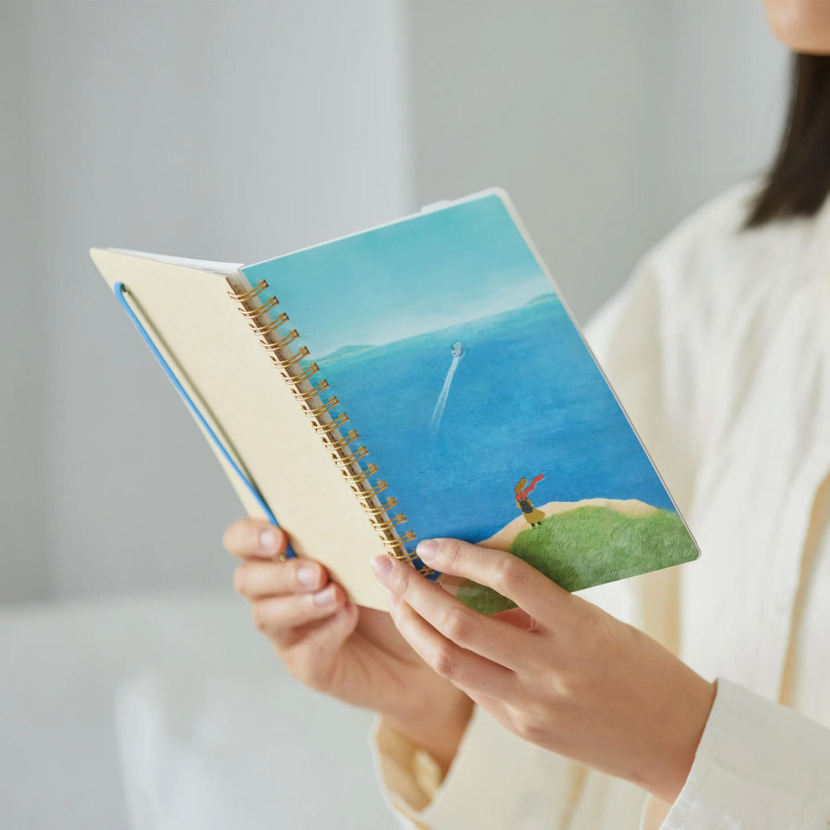 Zoomy BUNGU scenic ocean cliff and speedboat comic-size ring journal notebook, featuring vibrant coastal illustration and durable binding.