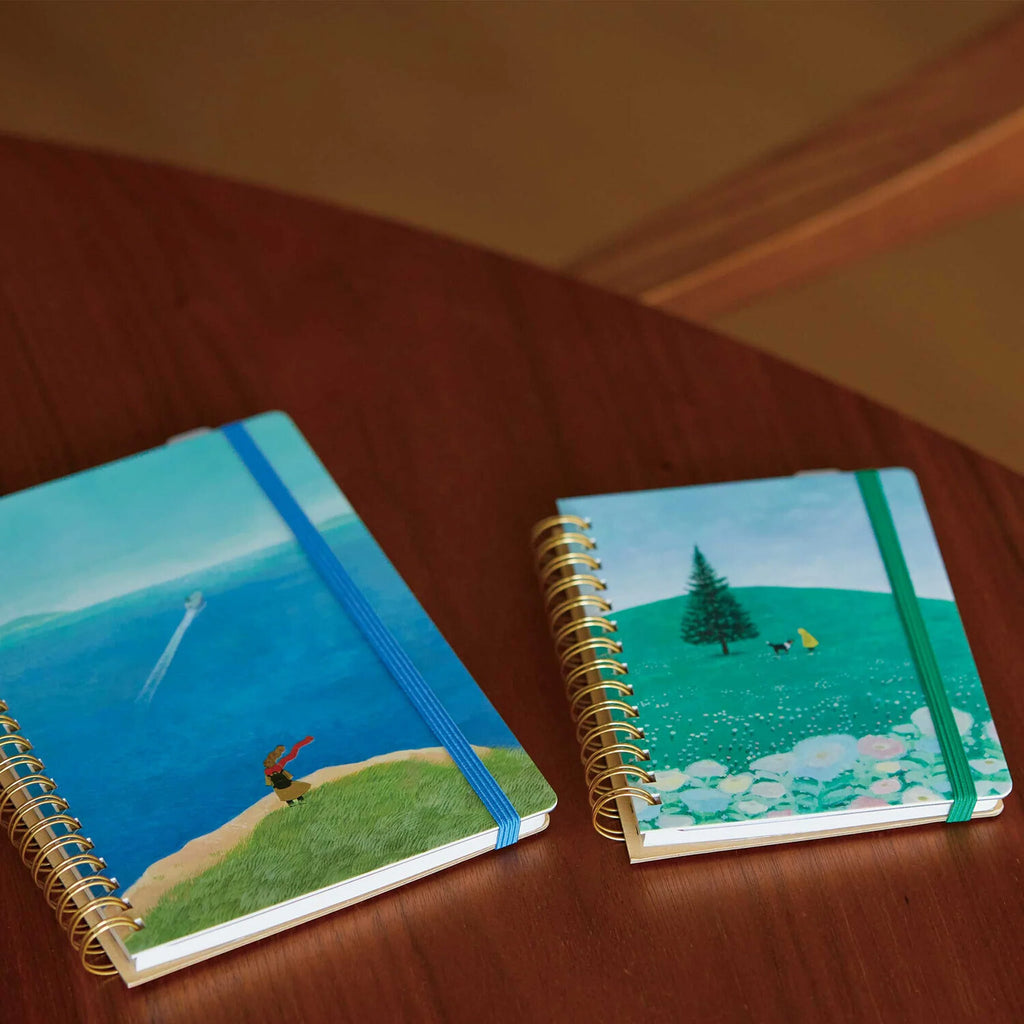 Zoomy BUNGU scenic ocean cliff and speedboat comic-size ring journal notebook for stationery lovers.