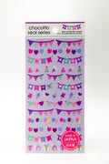 Colorful JapanoMono stickers featuring party bunting, balloons, and celebration decor for festive craft projects.