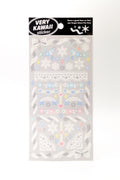 Set of winter-themed stickers featuring snowflake lace designs and pastel ribbons, perfect for decorating crafts and stationery.