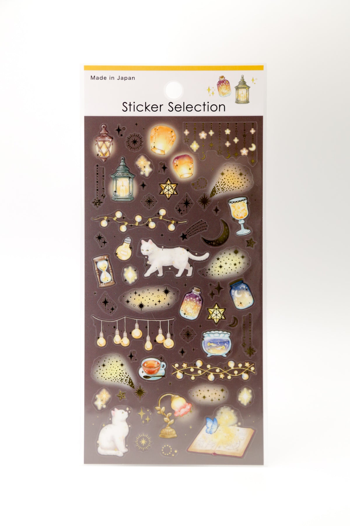Set of JapanoMono stickers featuring warm lanterns, a white cat, and starry night starlight designs on adhesive paper.
